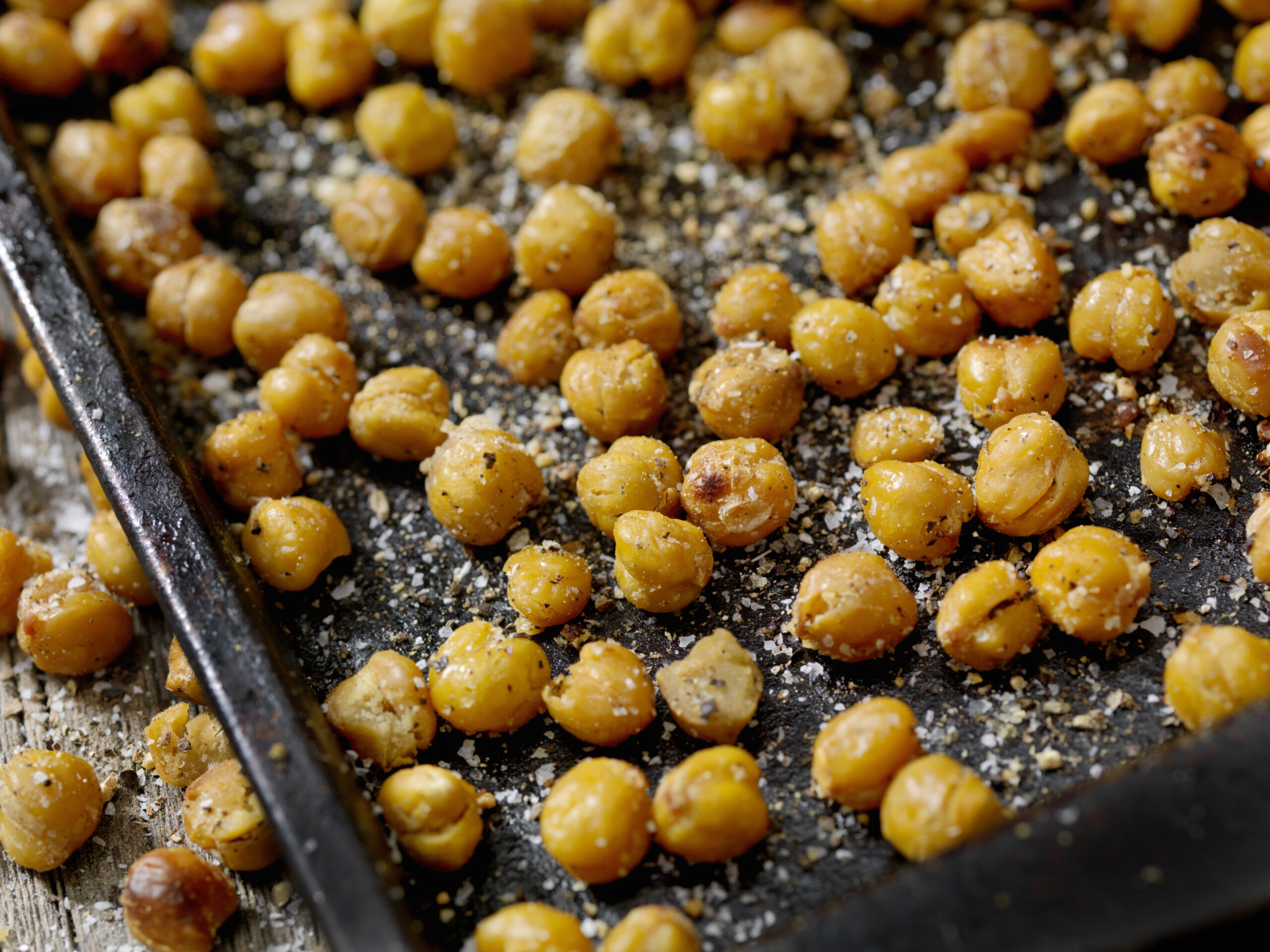 Crispy roasted chickpeas seasoned with spices and served as a healthy snack.