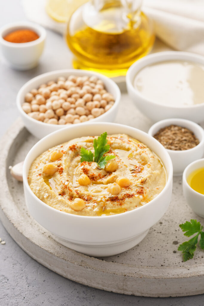 Premium dried chickpeas displayed in a kitchen setting with healthy cooking ingredients.